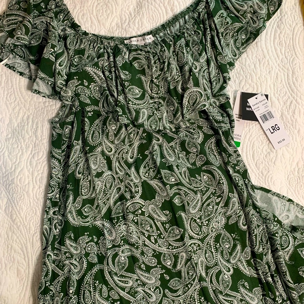 Sandra Darren dress that falls just below the knee.